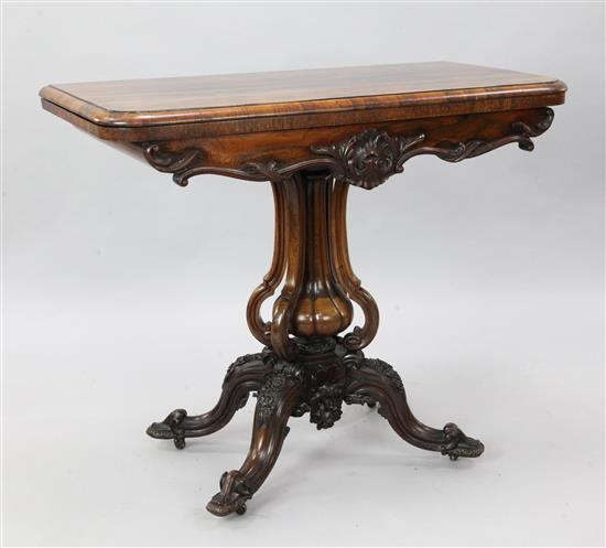 An early Victorian rosewood card table, W.2ft 11in. D.1ft 6in. H.2ft 6in.